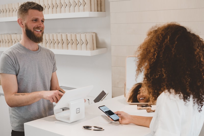 Person making a mobile payment for household utilities